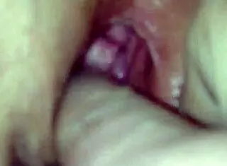 Amateur husband fingers his wife's wet pink pussy until she cums hard.