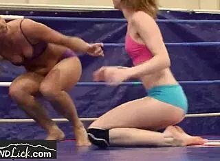 wrestling lesbian babes dive into juicy oral fun.