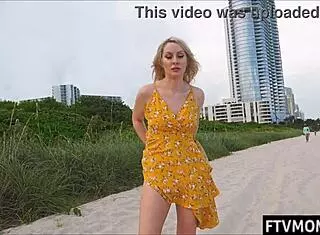 hot milf flashes in public at the beach