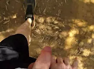 Hairy guy jerks off in public bush