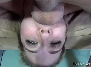 blonde babe chokes hard on deep throat action