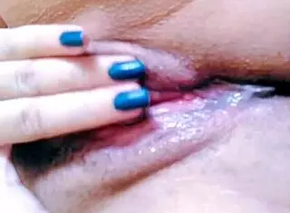 Look at her rubbing her pussy until it drips!