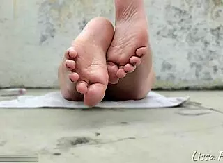 Beautiful Cute Oiled Feet Sunbaking POV