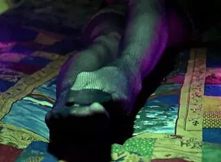 Perfect toes peeking through sexy fishnets