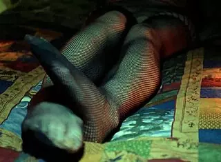 Perfect toes peeking through sexy fishnets