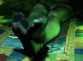 Perfect toes peeking through sexy fishnets