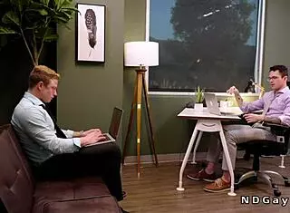 Gay Co-Workers Engage in Office Activities Together