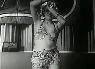 vintage showgirls tease with slow undressing in retro strip show