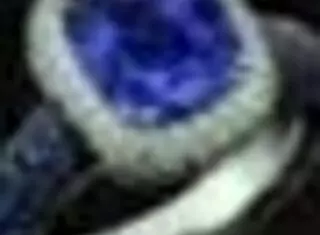 Watch this brunette lick and finger her shaved pussy with toys