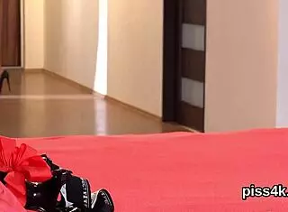 Watch these kissable lesbian nymphos get sprayed with pee and splash their wet snatches