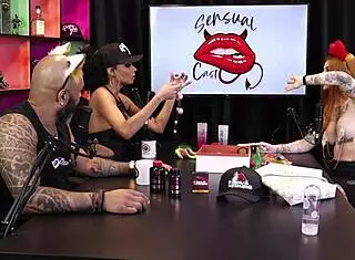 Two beautiful teens test sheer red product on breasts