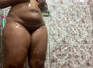 Morena dances funk while taking a relaxing bath.