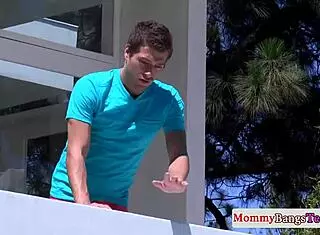 this busty blonde milf is fucking with some teen guys in a group