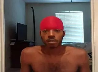 brunette bodybuilder does thigh muscle work in the gym with stockings on.