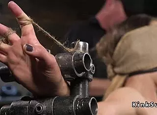 brunette slave endures rough anal hook in dark dungeon