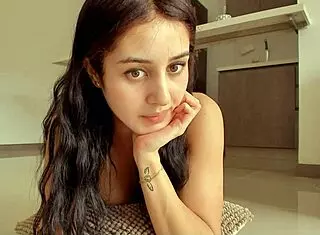 hot brunette shows off juicy ass in web chat sex session