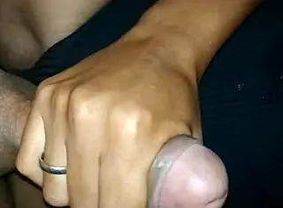 My girlfriend gives me a handjob while friend watches. Cumshot follows!