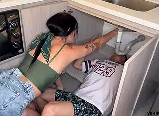 plumber fixes pipes in the house