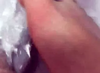 Hungarian babe takes off nylon and showers with footjob fetish