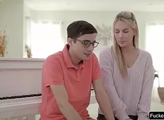 Busty Piano Teacher Engages In Detailed Lessons With Her Young Student