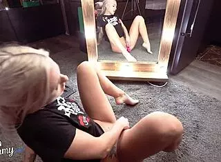 Sexy blonde masturbates with toys at mirror