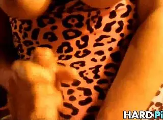 busty wife gives handjob at home