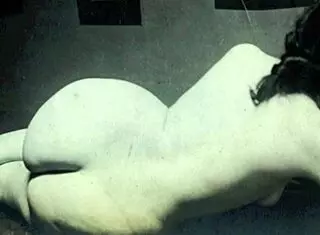 Eskimo nell shows retro hairy pussy!