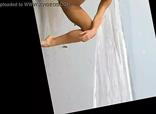 Beautiful model posing gracefully in the sandy beach setting