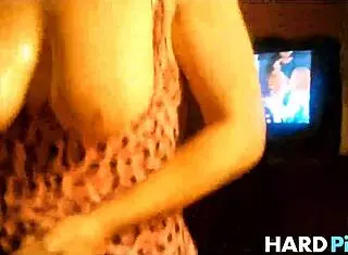 busty wife gives handjob at home