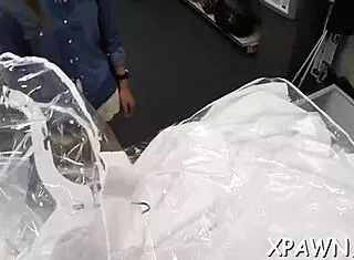 Couple's Intimate Moment in the Shop