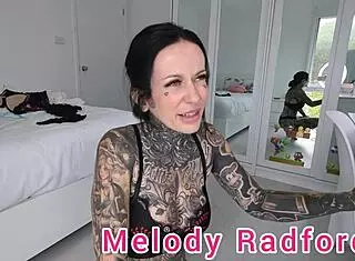 melody radford tries on black red lingerie closeup