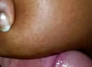 watch this amateur titfuck and blowjob, cumshot all over her tits in interracial fun.