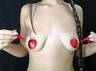 young girl teases with natural tits and nipple stickers, so hot!