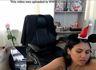 Naughty Shana plays with dildo in office