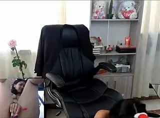 Naughty Shana plays with dildo in office