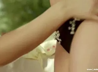 enjoying a fun lesbian session with toys together