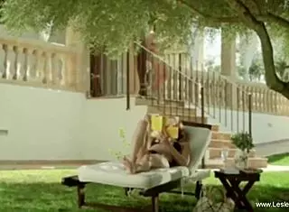 enjoying a fun lesbian session with toys together