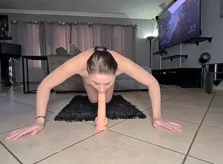 Brunette Sucks Dildo While Working Out Nude