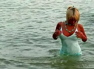 masha strips naked showing her shaved pussy and ass