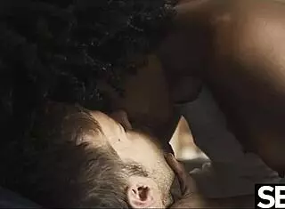 Ebony beauty joins a horny couple for passionate threesome sex.