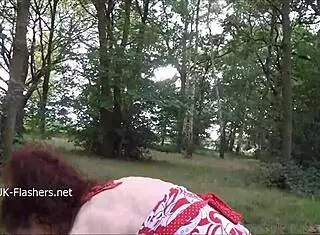 Scarlet redhead flashes tits outdoors intensely