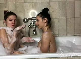 nelly kent and gina gerson kiss and touch in bathroom