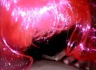 Beauty With Pink Hair Performs Coin Trick