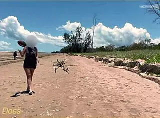 Wife plays football nude at public clothed beach for daring fun