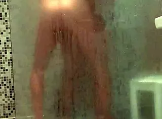 wife gives a sloppy blowjob in the homemade shower.