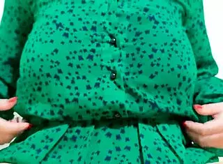 Hot girl strips her dress, moaning loudly.