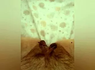 Greta warms under the blanket