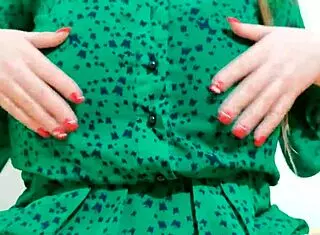 Hot girl strips her dress, moaning loudly.