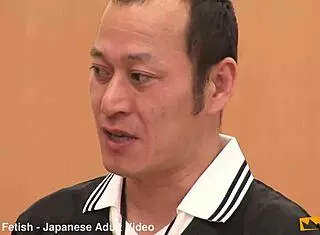 japanese female team listens and takes a lesson from their coach. cute brunette babe in costumes follows instructions closely