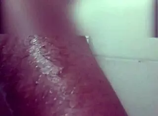 horny milf films herself naked in the bathroom